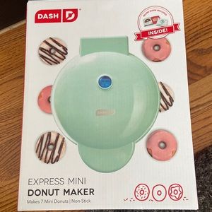 Brand new in box Dash Donut Maker. Recipes included. Aqua in color